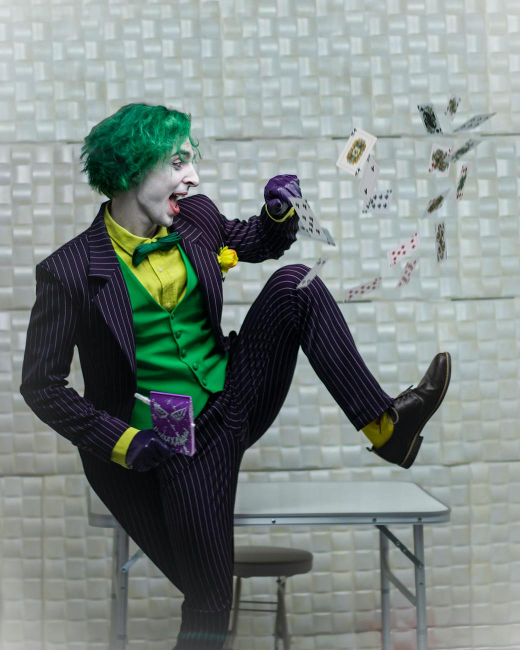 man flashing cards in the mid air