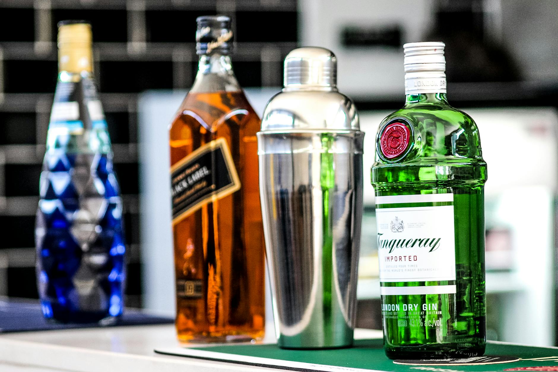 four different alcoholic bottles