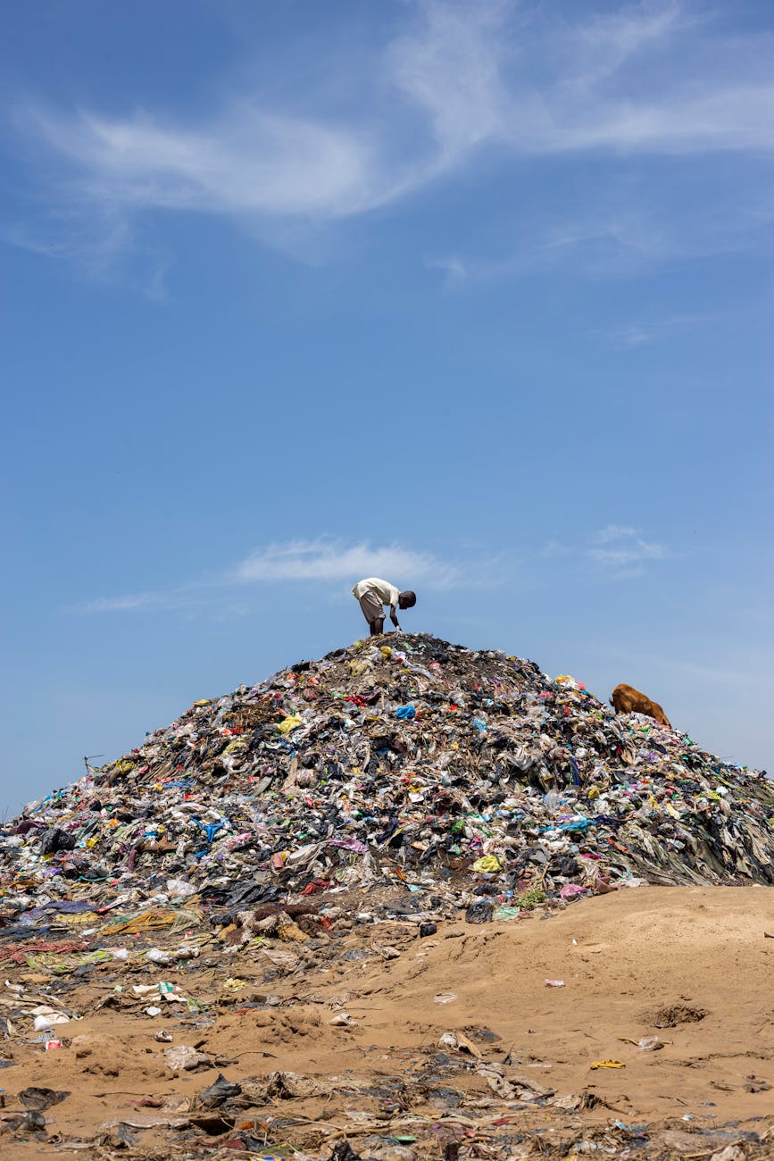 man working at garbage dump