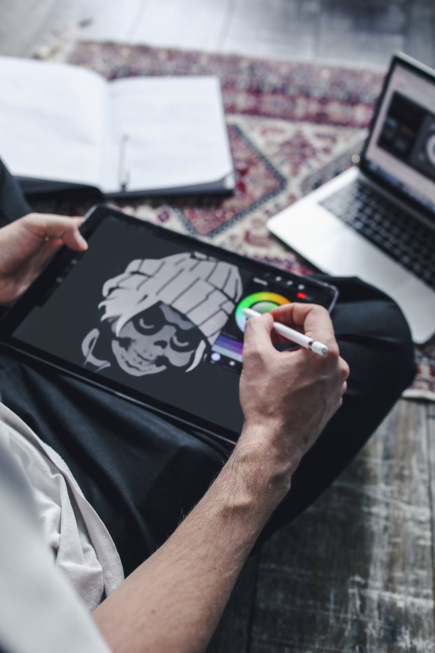 a person holding a digital tablet