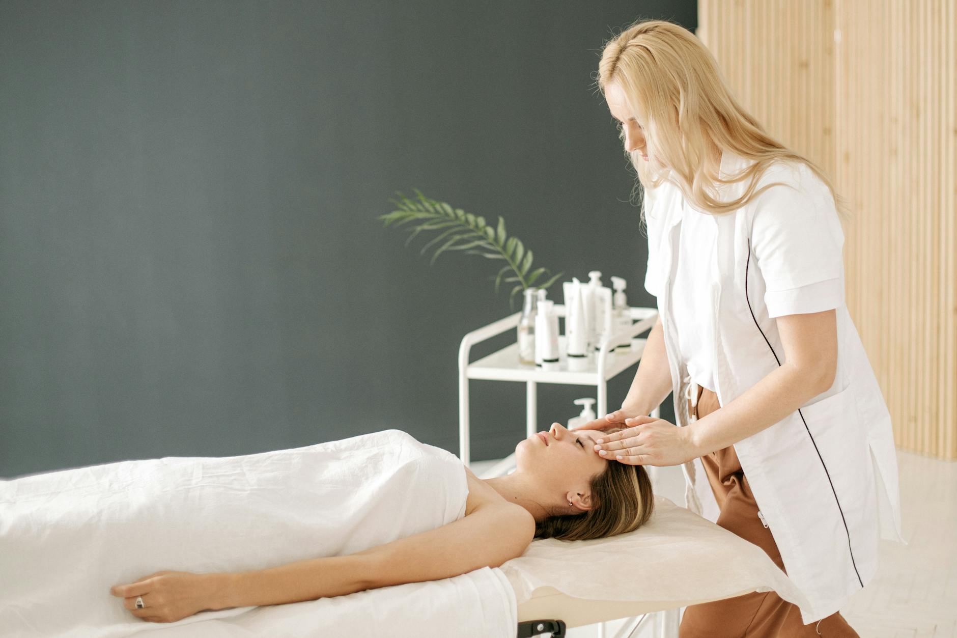a woman doing head massage