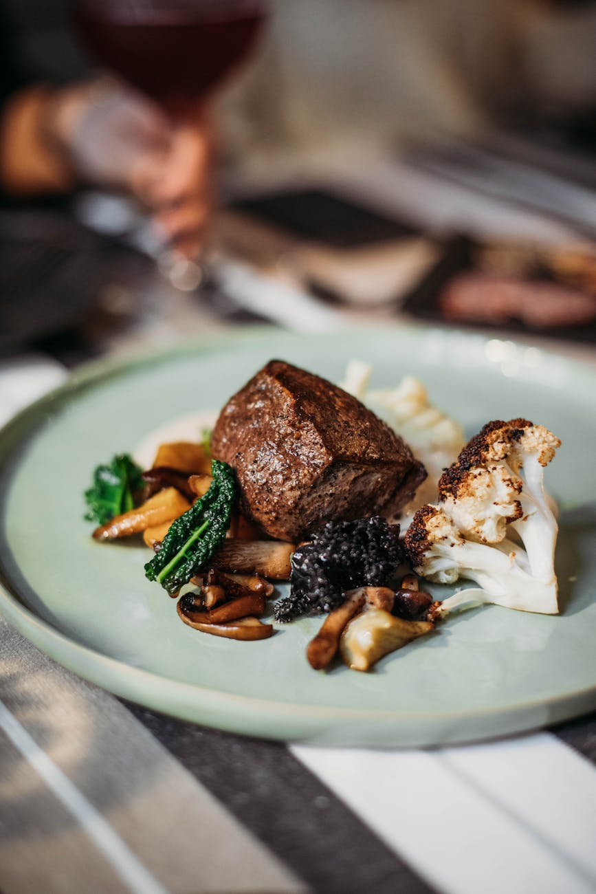 steak served with grilled cauliflower