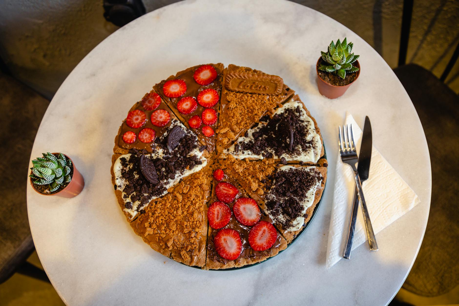 strawberry slices on top of the cake